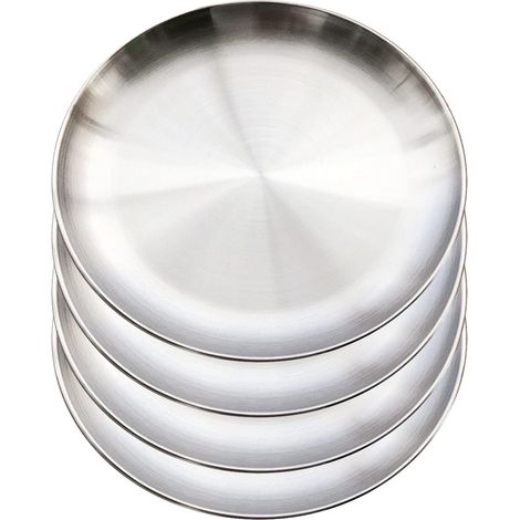 Vier Poêles Zu Grillrunden Aus Rostfreiem Edelstahl, Die Auch Mit Kuchen, Torten Oder Ovalen Tellern Serviert Werden Können.