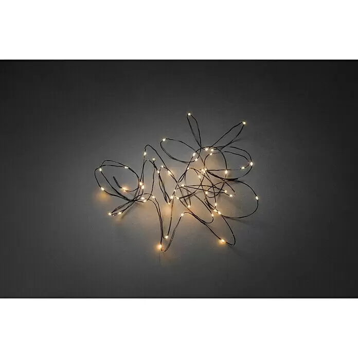 Konstsmide LED-Lichterkette Tropfenlichterkette (Innen, Lichtfarbe: Bernstein, Anzahl Leuchtmittel: 100 Stk., Netzbetrieben, Schwarz)