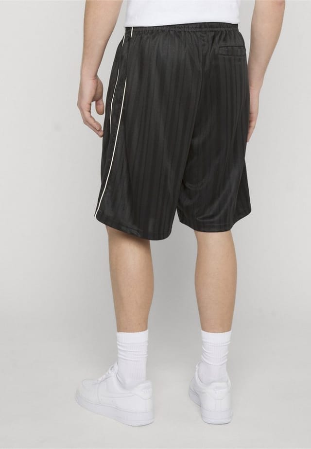 Karl Kani Trainingsshorts Karl Kani Signature Shadow Stripe Trackshorts (1-tlg)