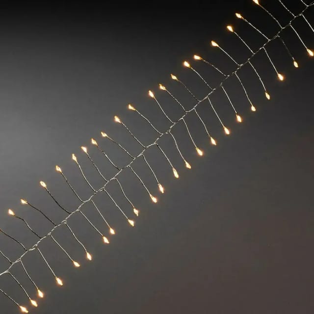 Konstsmide LED-Lichterkette Micro LED Firecracker (Innen, Lichtfarbe: Bernstein, Anzahl Leuchtmittel: 60 Stk., Batteriebetrieben, Silber)