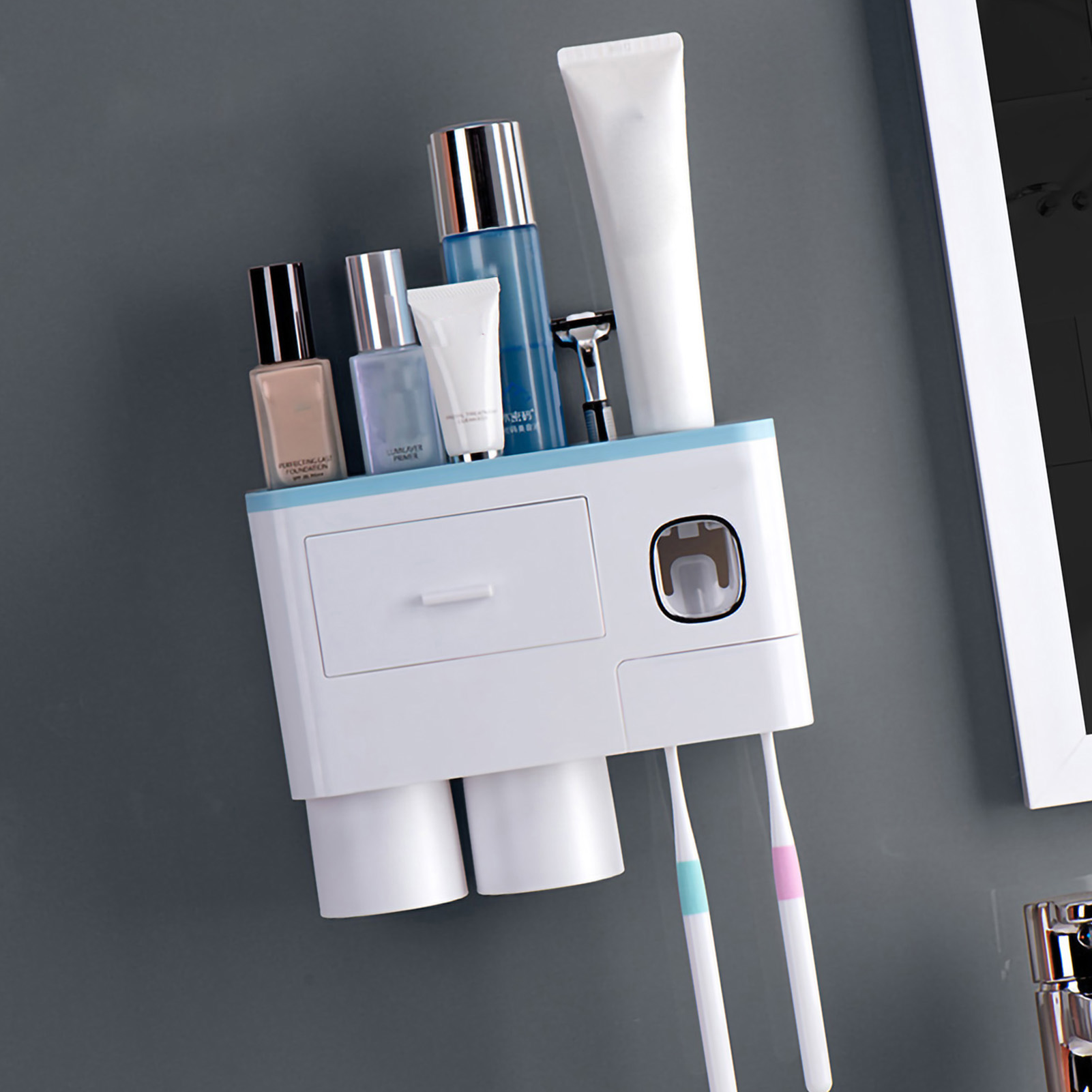Aufbewahrungsständer Für Umgedrehte Magnetische Zahnbürsten, Mit Tubenausdrücker Für Zahnpasta Und 2 Blauen Bechern.