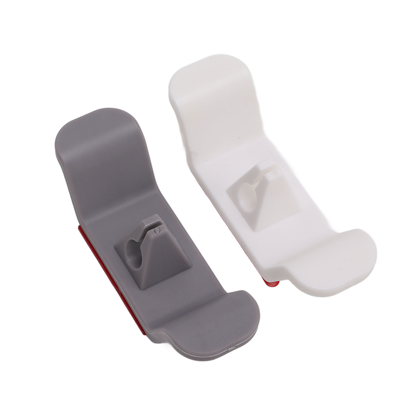 Set Mit 2 Grauen Und Weißen Kabelorganisatoren Aus Kunststoff Für Kleine Küchengeräte.