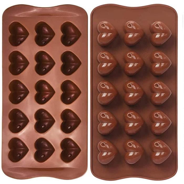 Zwei Herzförmige Schokoladenformen Aus Silikon, Geeignet Für Pralinen, Kuchen, Gelees, Puddings Und Fondant. Hergestellt Aus Antihaftbeschichtetem Silikon.