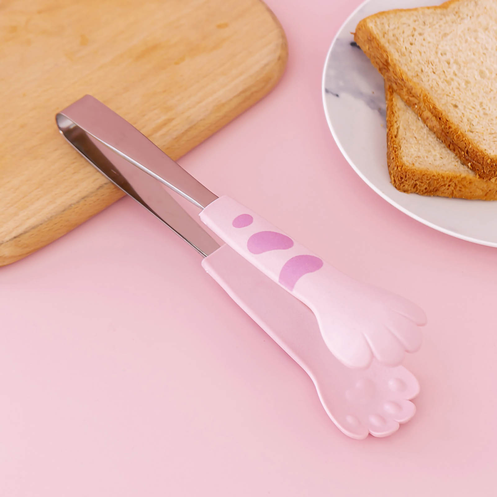 Kleine, Rosafarbene Küchenzange Aus Edelstahl In Form Einer Katzenpfote, Ideal Für Salate Und Grillgerichte.
