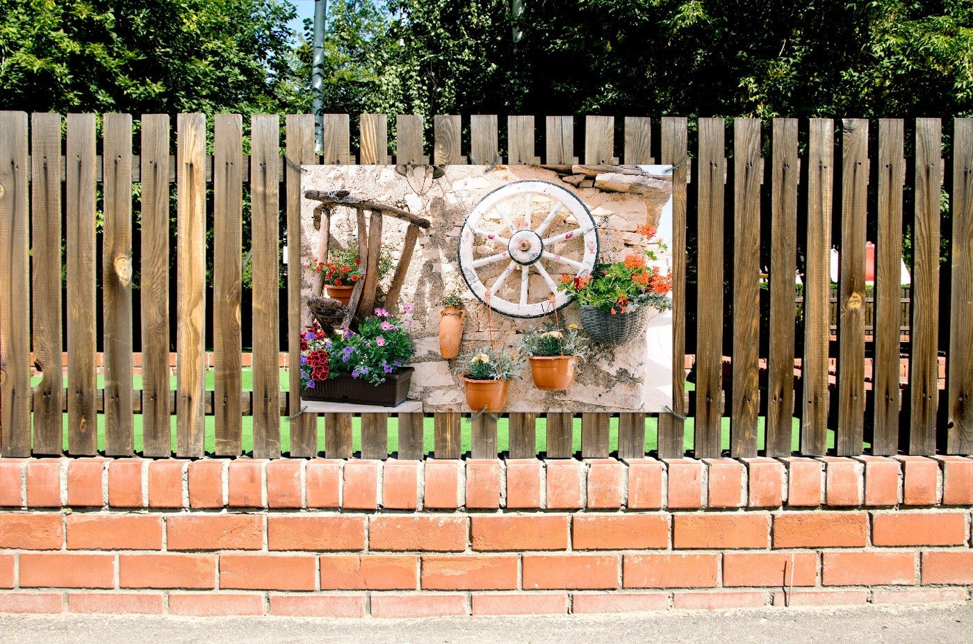 Wallario Sichtschutzzaunmatten Wagenrad an Natursteinwand Bild 2