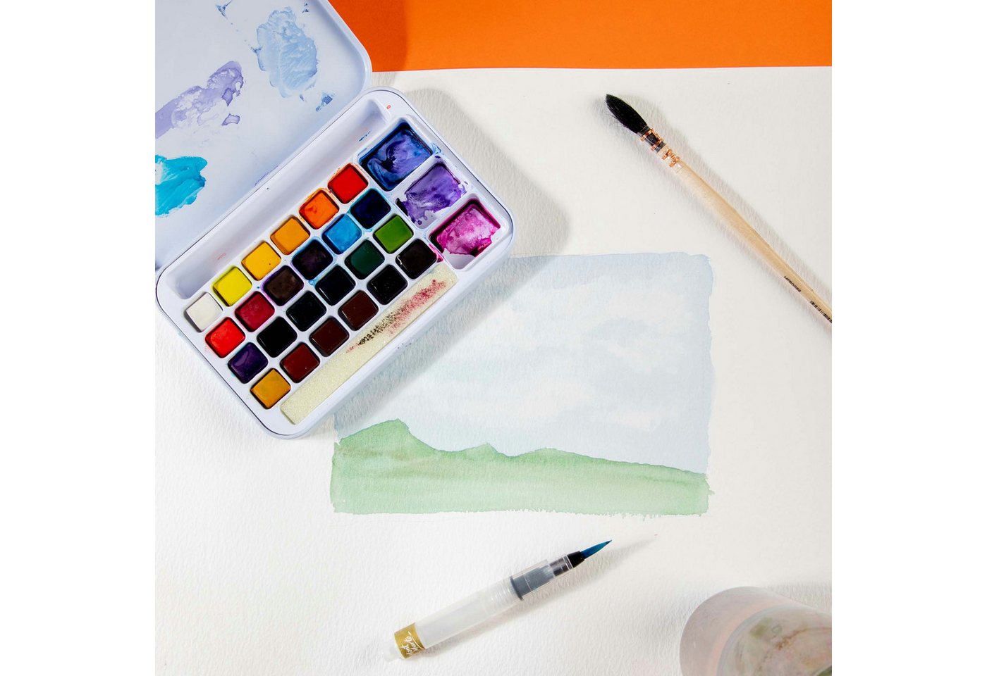 Mont Marte Aquarellfarbe Set 24 / 36 Farben – Malset mit Wassertankpinsel, Etui mit Fingerring, Ideal für Reisen, Urban Sketching & kreative Auszeiten Bild 2