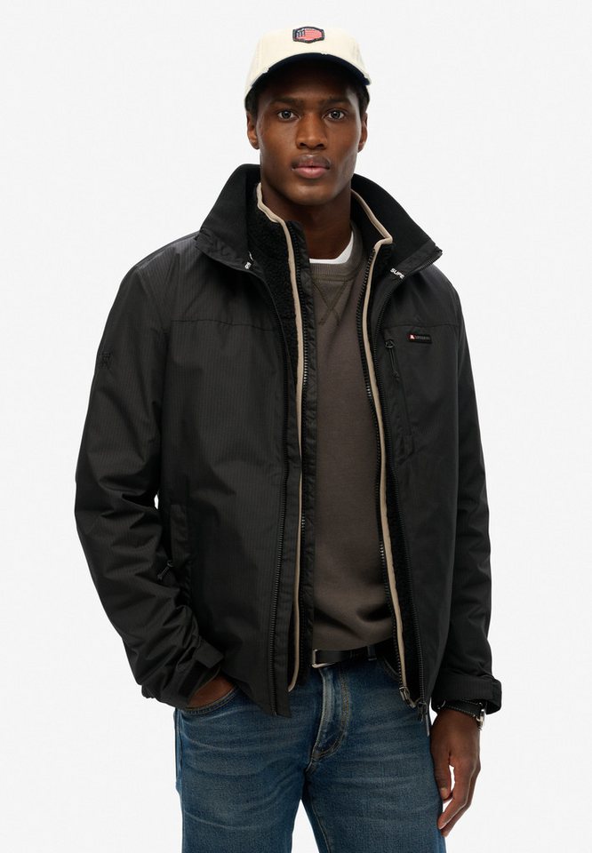 Superdry Outdoorjacke NON HOOD LOGO WINDBREAKER mit Obermaterial aus Polyester, hüftlange Passform, unifarben Bild 5