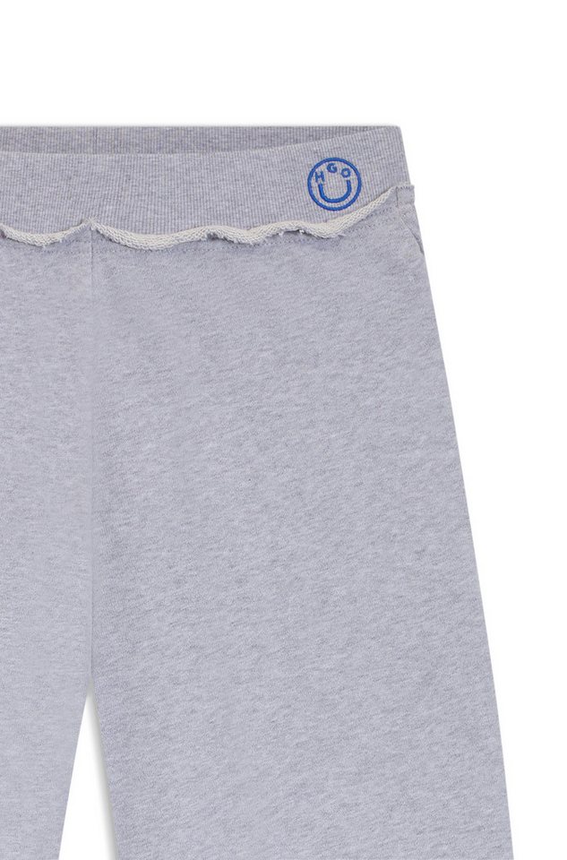 HUGO Jogger Pants Nuwaist mit Raw Cut Hem, weites Bein
