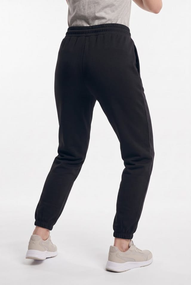 PUMA Trainingshose HER COMFORT PANTS FL mit Comfort Fit, unifarben