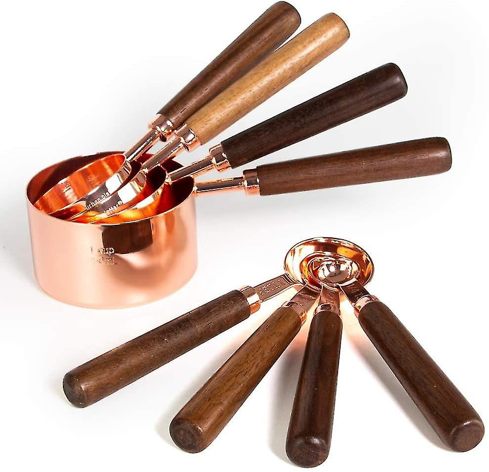 Set Aus 8 Hochwertigen Messbechern Und -löffeln Aus Edelstahl, Roségoldene Ausführung.