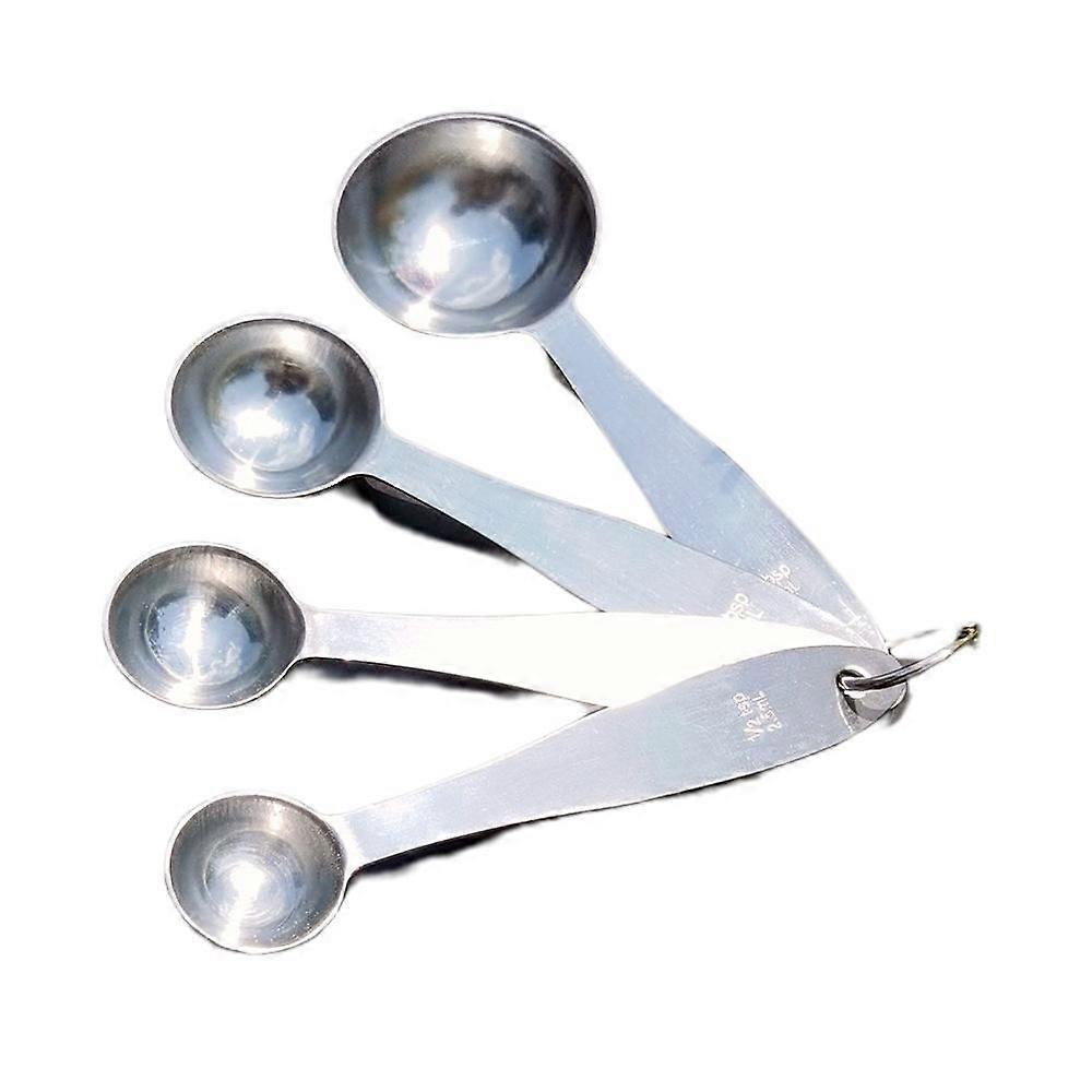 Set Mit 4 Messlöffeln Aus Edelstahl Zum Abmessen Von Flüssigen Und Trockenen Zutaten Beim Kochen Und Backen.