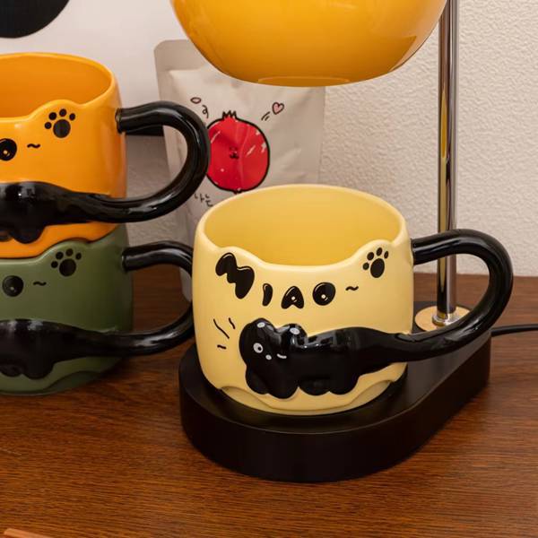 1 Stück. Farbe: Gelb. Material: Keramik. Schwarze Katzentasse Mit Geprägtem Muster Und Großem Henkel. Kaffeetasse.