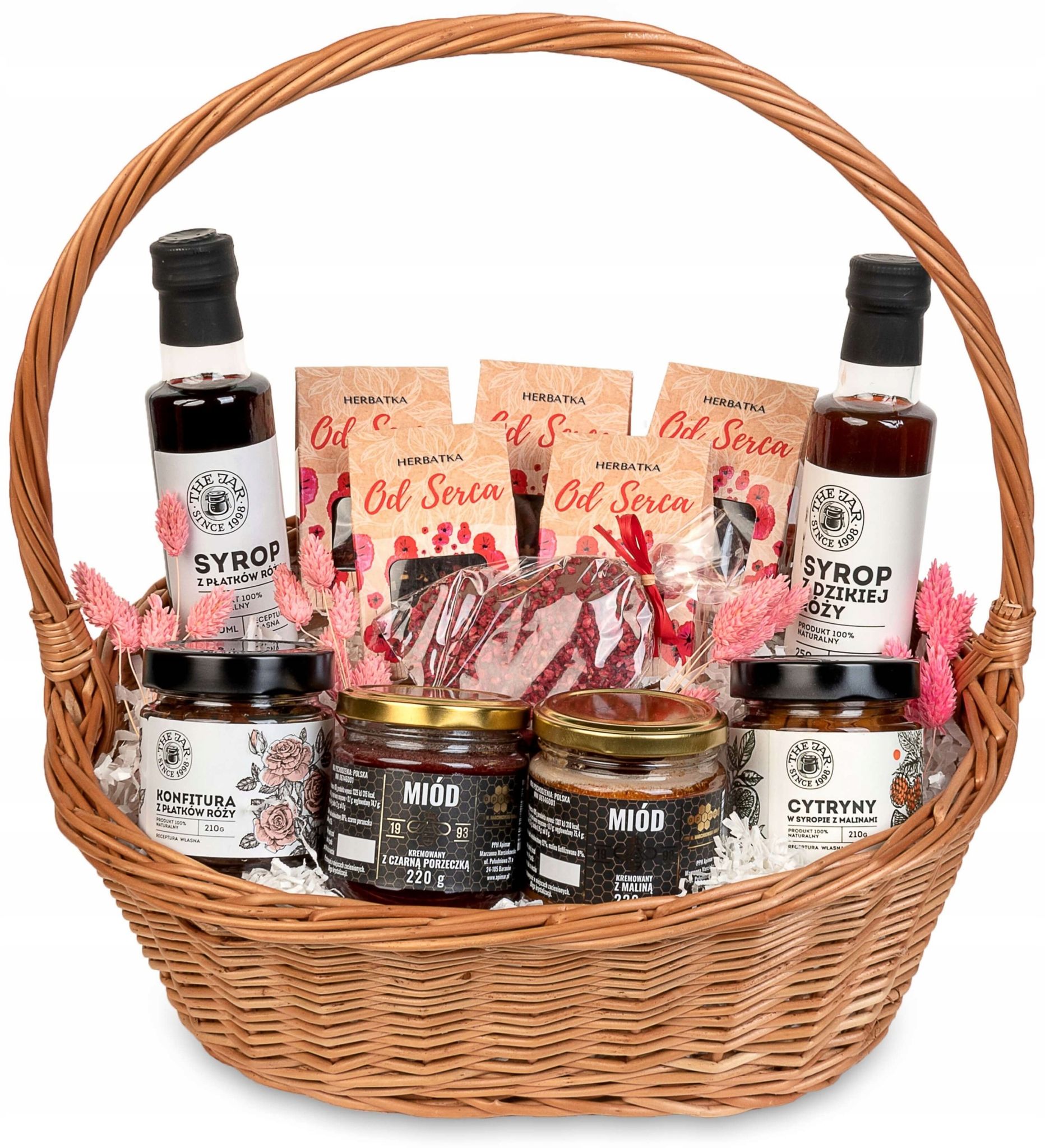 Ein Großer Geschenkkorb Mit Tees Von Herzen, Weide, Honig, Schokolade Und Sirup