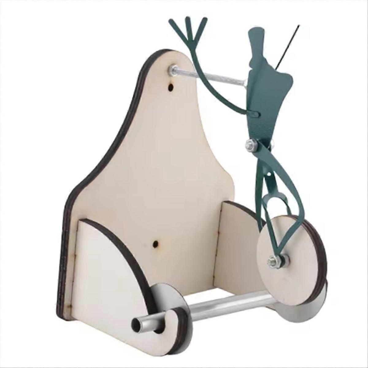Witziger, An Der Wand Befestigter Toilettenpapierhalter In Form Eines Frosches Auf Einem Fahrrad