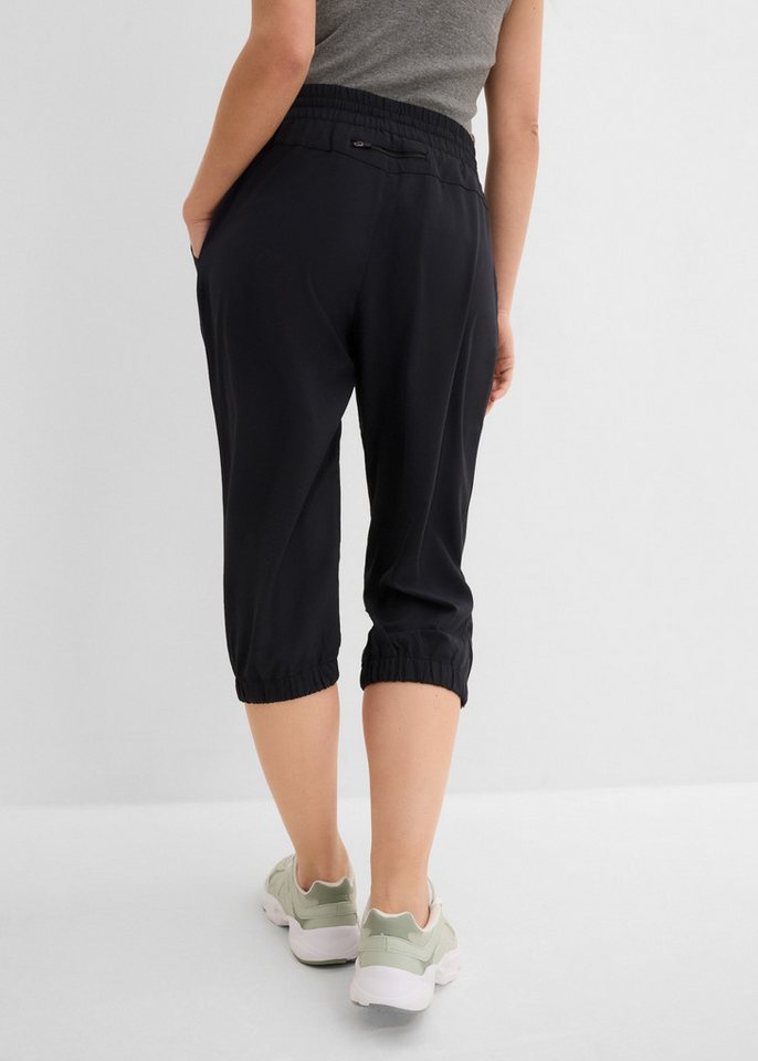 bonprix Funktionshose in 7/8 länge, Seitenschlitze mit Zipper, Reißverschlusstasche hinten