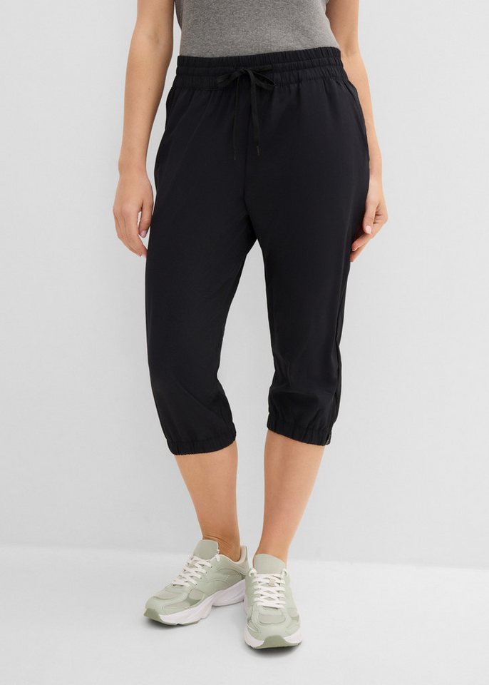 bonprix Funktionshose in 7/8 länge, Seitenschlitze mit Zipper, Reißverschlusstasche hinten Bild 4