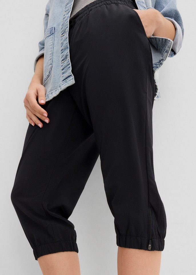 bonprix Funktionshose in 7/8 länge, Seitenschlitze mit Zipper, Reißverschlusstasche hinten Bild 5