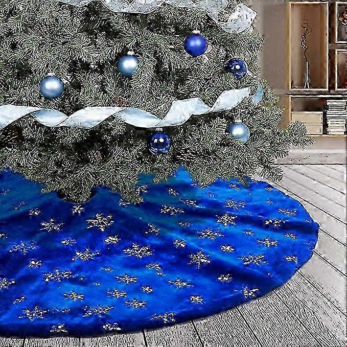 Dekorative Weihnachtsbaumdecke Mit Schneeflocken, Glitzerndem Silbernen Rand Und Blauem Plüschsockel