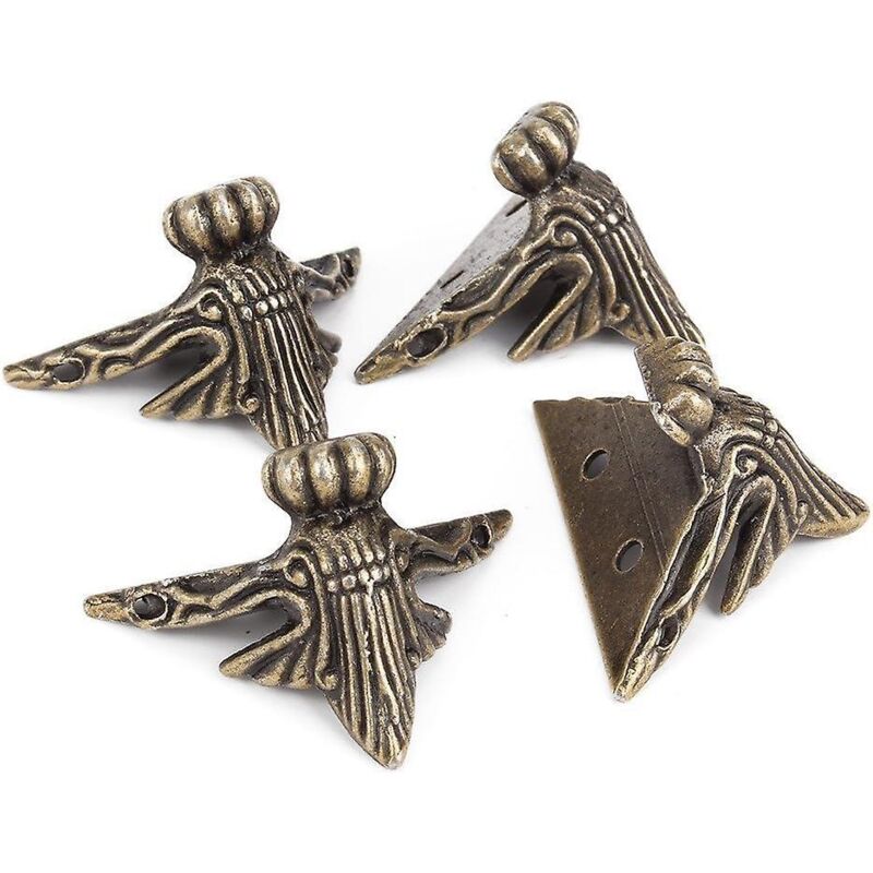 Set Mit 4 Kleinen Dekorativen Eckfüßen Aus Metall