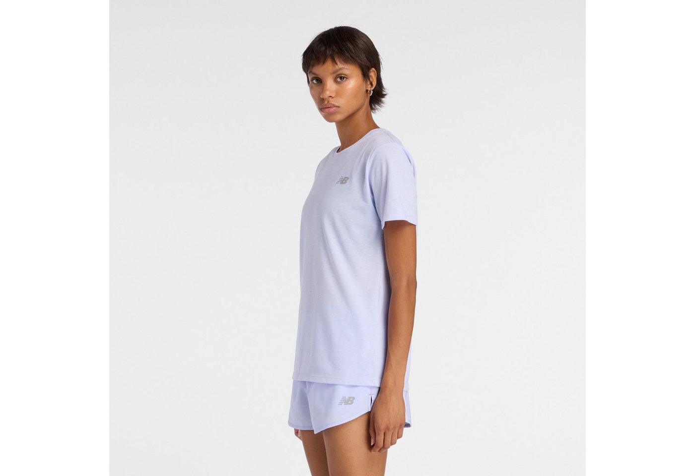 New Balance Laufshirt Sport Essentials Heathertech T-Shirt sportlicher Stil mit Label-Applikation, aus Baumwolle und Polyester