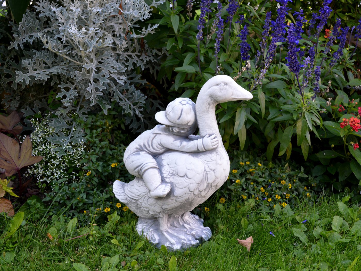 gartendekoparadies.de Gartenfigur Nils Holgersson mit der Wildgans, Steinfigur, H. 37 cm, 10 kg, Frostsicher Bild 5