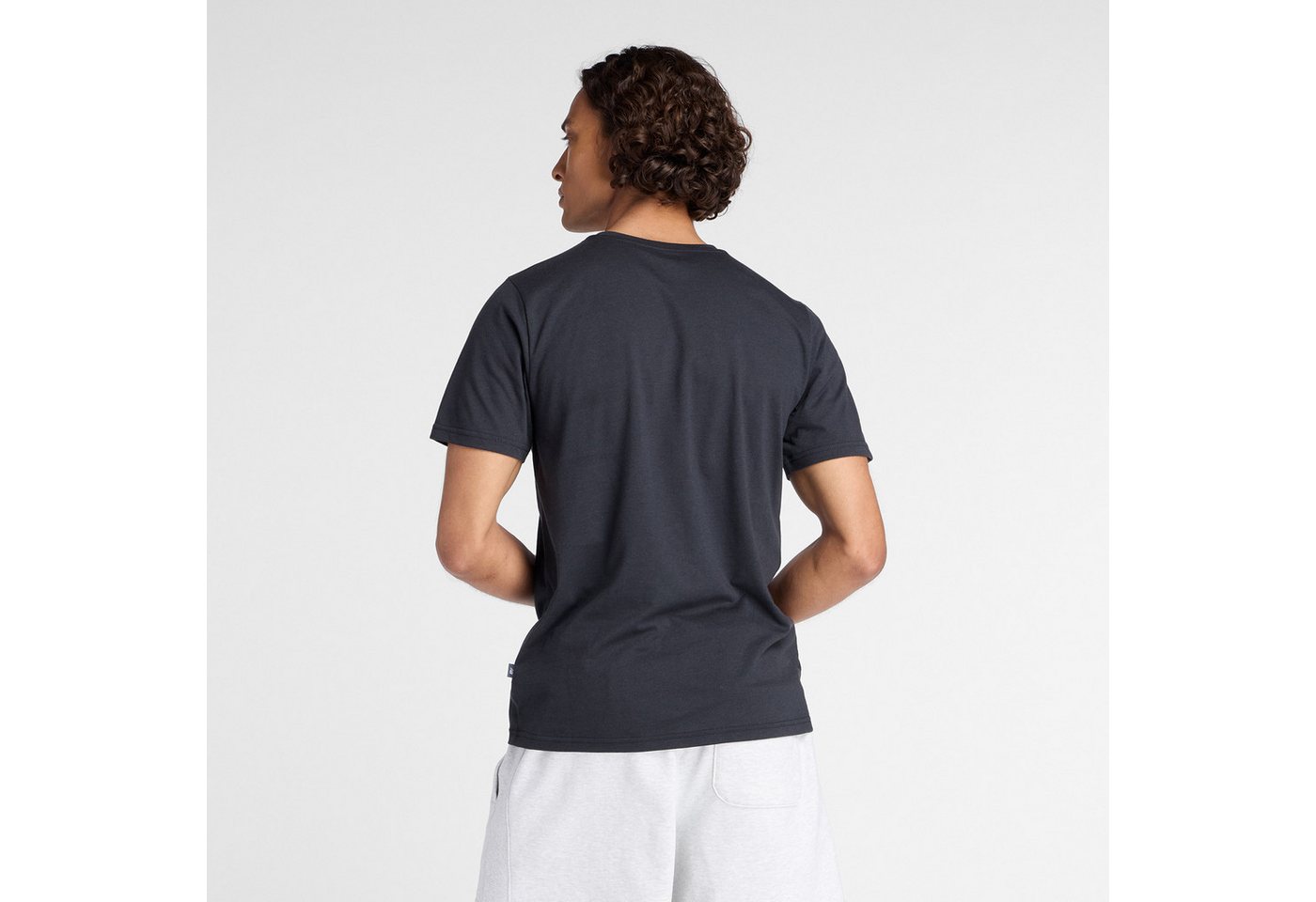 New Balance Trainingsshirt Heathertech Graphic T-Shirt 2 BLACK atmungsaktives Material, schnell trocknend, auch in großen Größen