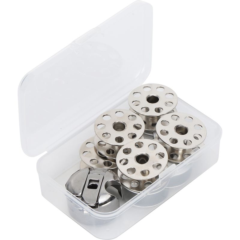 Set Mit 10 Metallspulen, Spulenkapsel, Obertransportfuß Und Zubehör Für Industrienähmaschinen.
