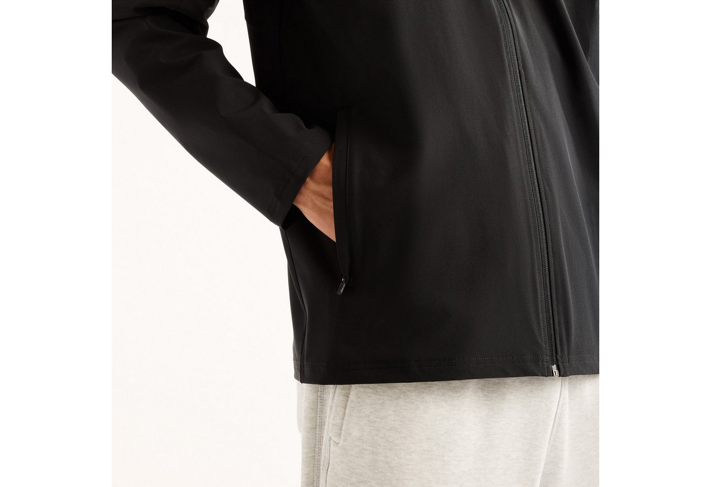 New Balance Trainingsjacke UTILITY STRETCH WOVEN JACKET Trainingsjacke für Fitness und sportliche Aktivitäten