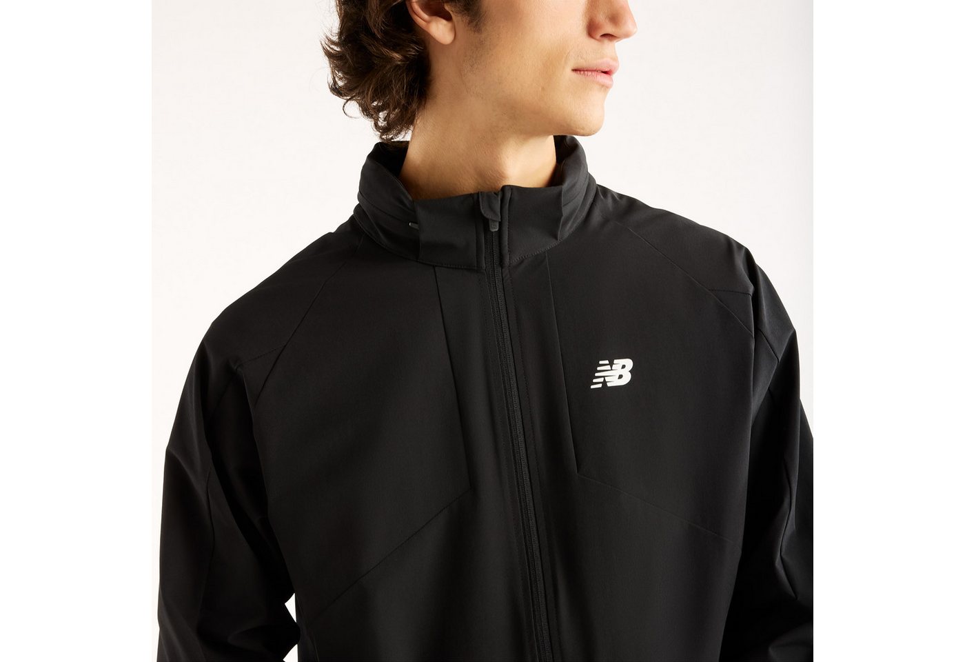 New Balance Trainingsjacke UTILITY STRETCH WOVEN JACKET Trainingsjacke für Fitness und sportliche Aktivitäten Bild 2