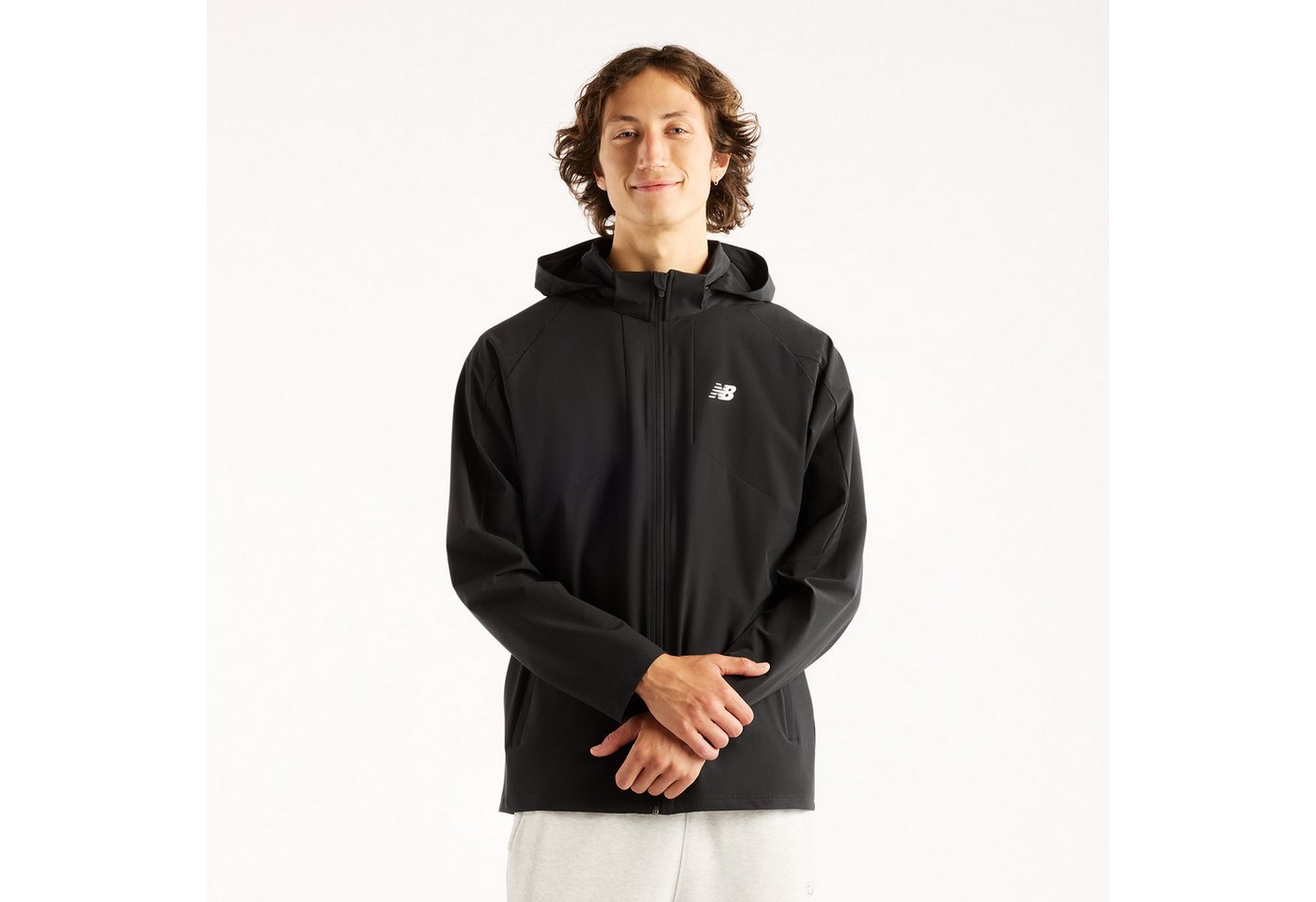 New Balance Trainingsjacke UTILITY STRETCH WOVEN JACKET Trainingsjacke für Fitness und sportliche Aktivitäten Bild 4