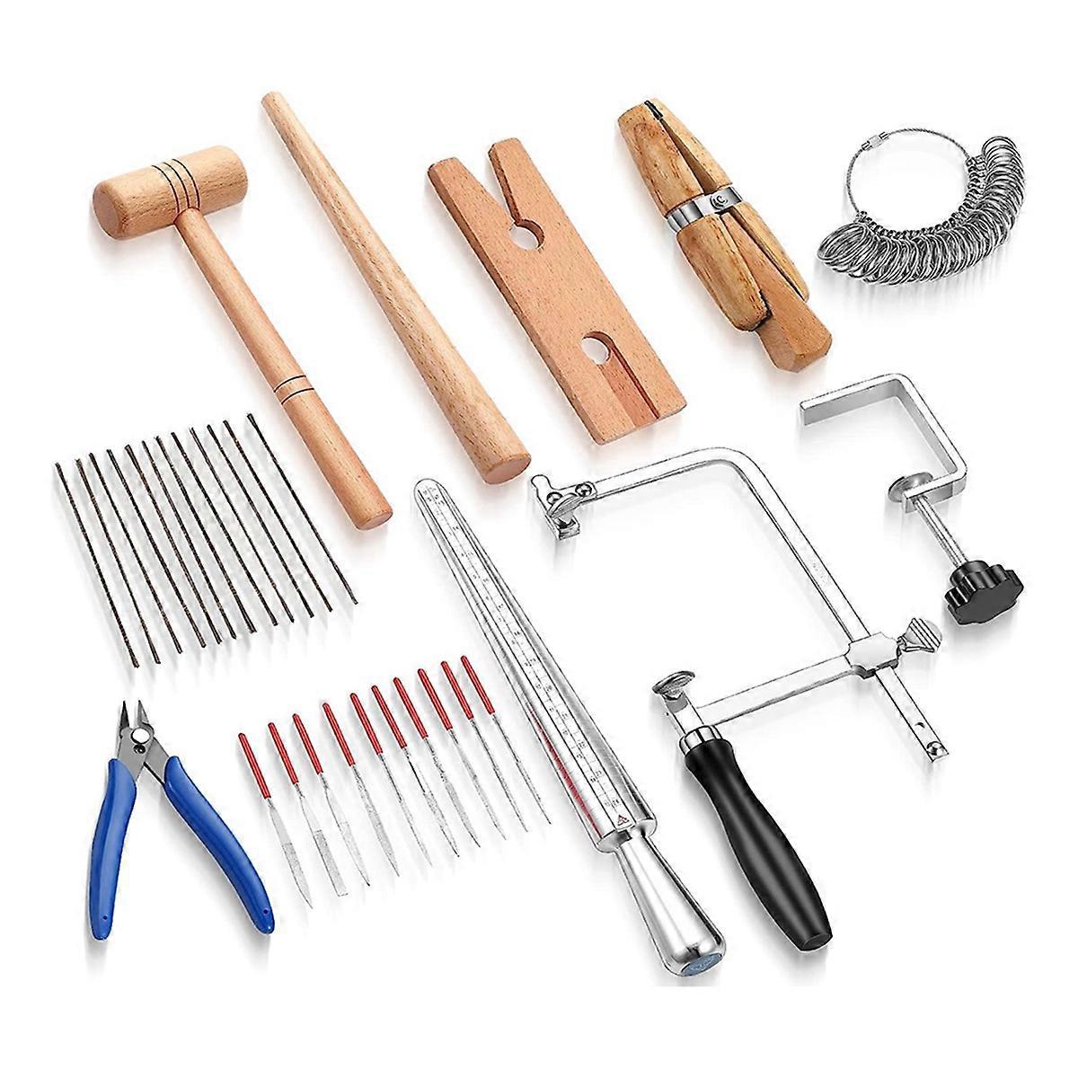 L'Ensemble D'Outils Comprend Une Scie De Bijoutier, Un Établi, Une Pince À Aiguille.