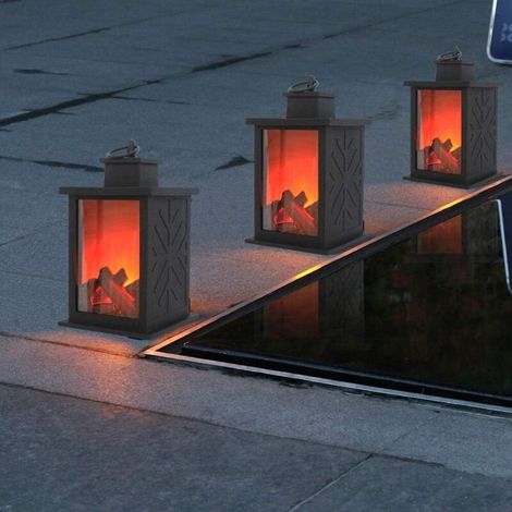 Traditionelle Und Gemütliche Kaminlaterne Aus Einer Led-tischlampe Im Kohle-look Mit Realistischem Flammeneffekt.