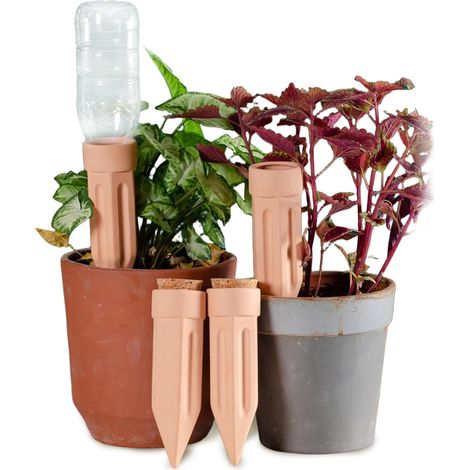 4-teiliges Set Aus Oya-korken, Tropfbewässerung, Terrakotta-pflanztopf Und Gartenartikeln.