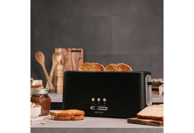 Toaster ausKunststoff mit 1 extra breiten Langschlitz für 2 Scheiben Toast. Ausführung in Edelstahl eeinschließlich Muffinhalter.
