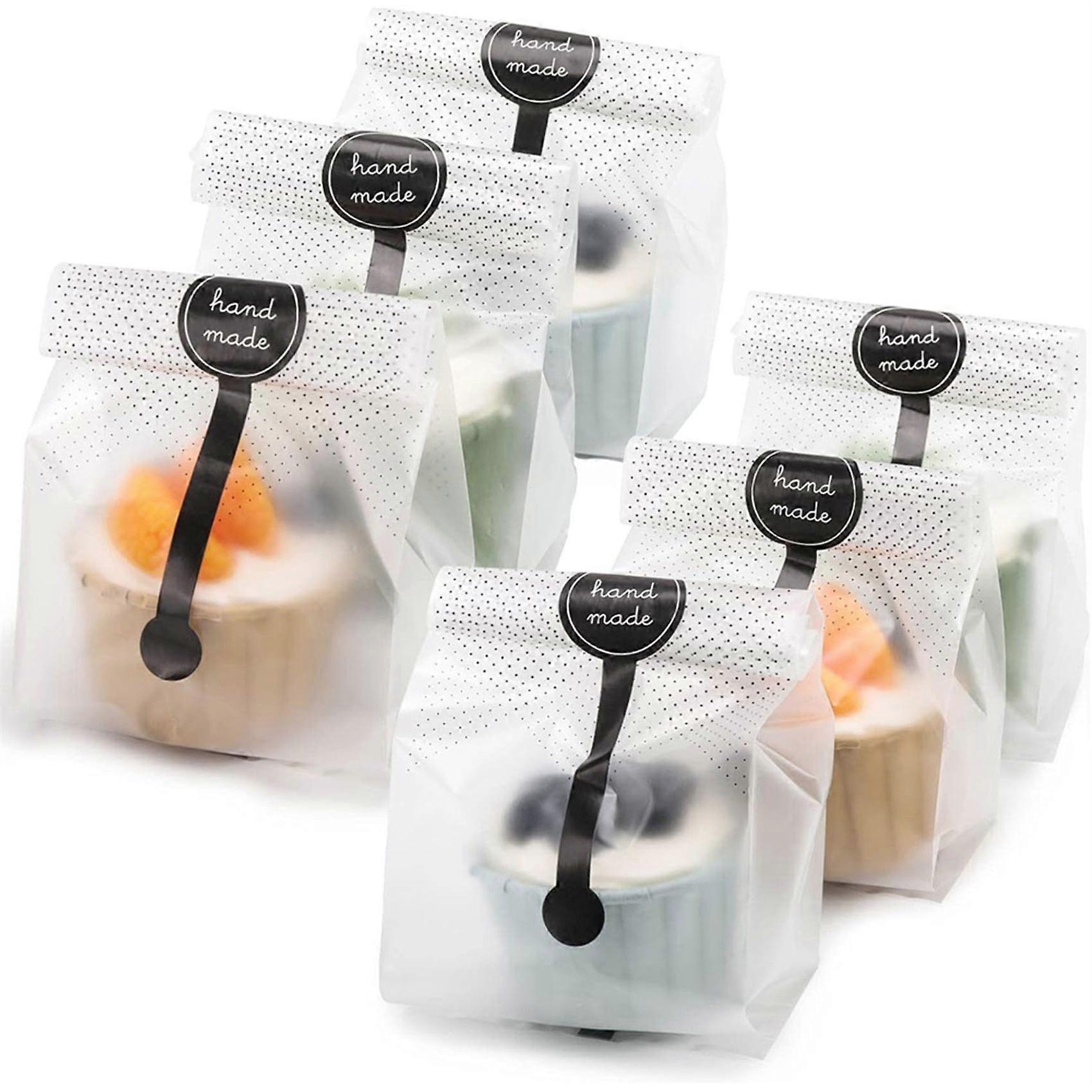Packung Mit 100 Durchsichtigen Plastiktüten Mit Schwarzen Aufklebern, Geeignet Zum Verpacken Von Gebäck, Partykeksen Und Süßigkeiten.