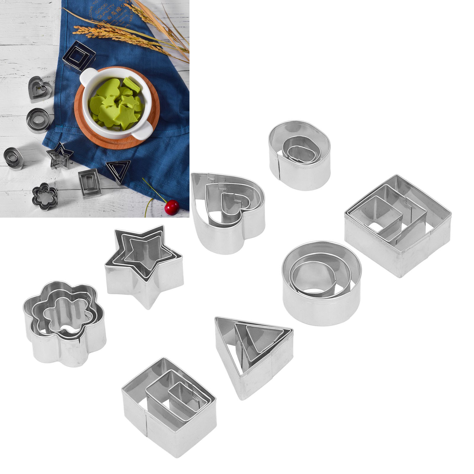 Set Mit 24 Ausstechformen Aus Edelstahl In Einer Aluminiumbox, Darunter Mini-geometrie-muster Und Obstkuchenformen.