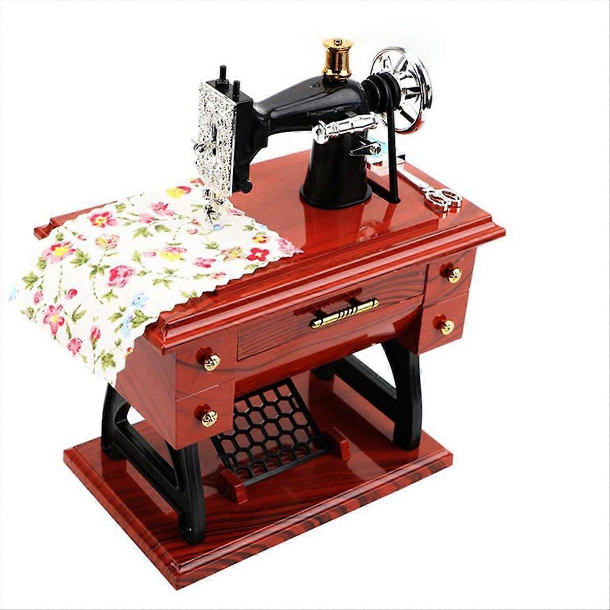 Vintage, Handgekurbelte Spieluhr Im Stil Einer Mini-nähmaschine
