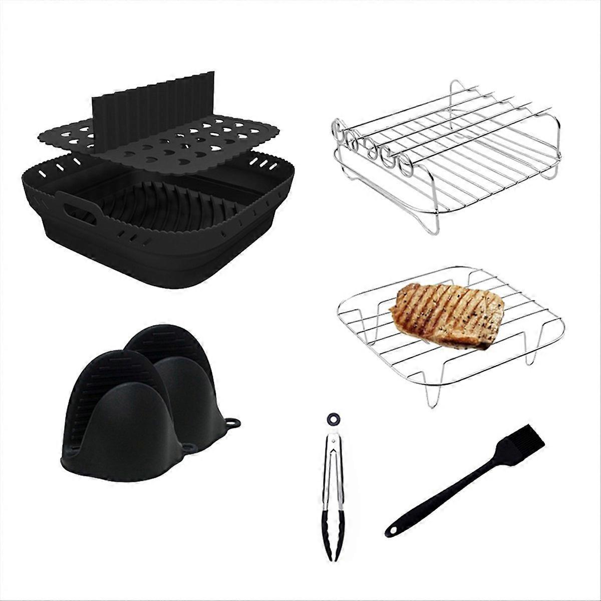 Set Aus Schwarzen Silikonkörben Und -blechen Für Heißluftfritteusen