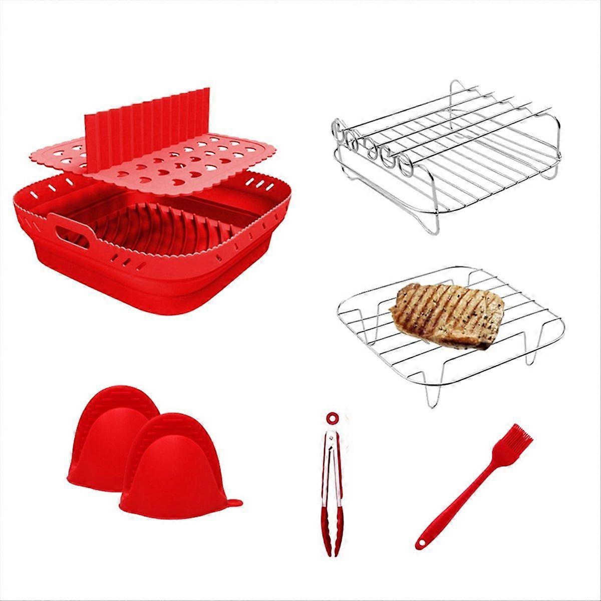 Set Aus Roten Silikonkörben Und -blechen Für Heißluftfritteusen