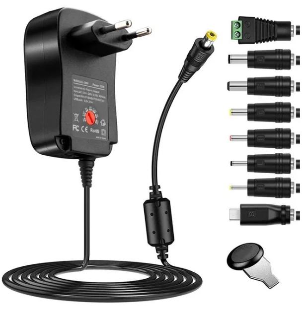 Universeller Ac/dc-netzadapter, Schaltnetzteiltransformator Mit 8 Dc-anschlüssen.
