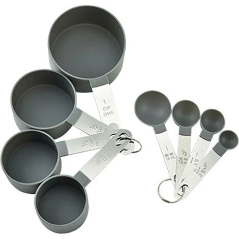 Set Aus 8 Stapelbaren Messbechern Und -löffeln Aus Edelstahl, Darunter Ein Präziser Esslöffel Zum Abmessen Von Trockenen Und Flüssigen Zutaten Sowie Ein Kleiner Teelöffel Mit Integriertem Messlöffel.