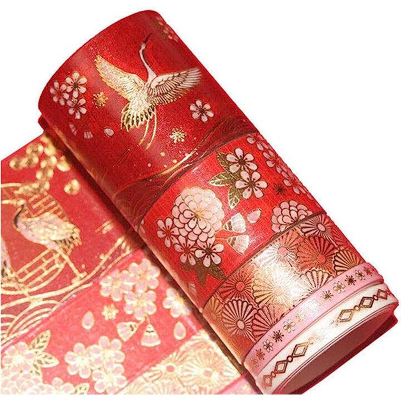 Schachtel Mit 5 Rollen Goldenem Band Mit Feenkranichmotiven. Dekoratives Band Für Fotoalbumränder.