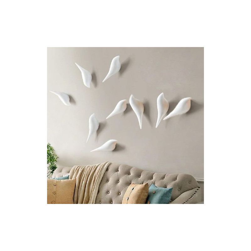 Set Aus Vogelförmigen Wandhaken, Holzstiften, Wandhängern Im Art-deco-stil