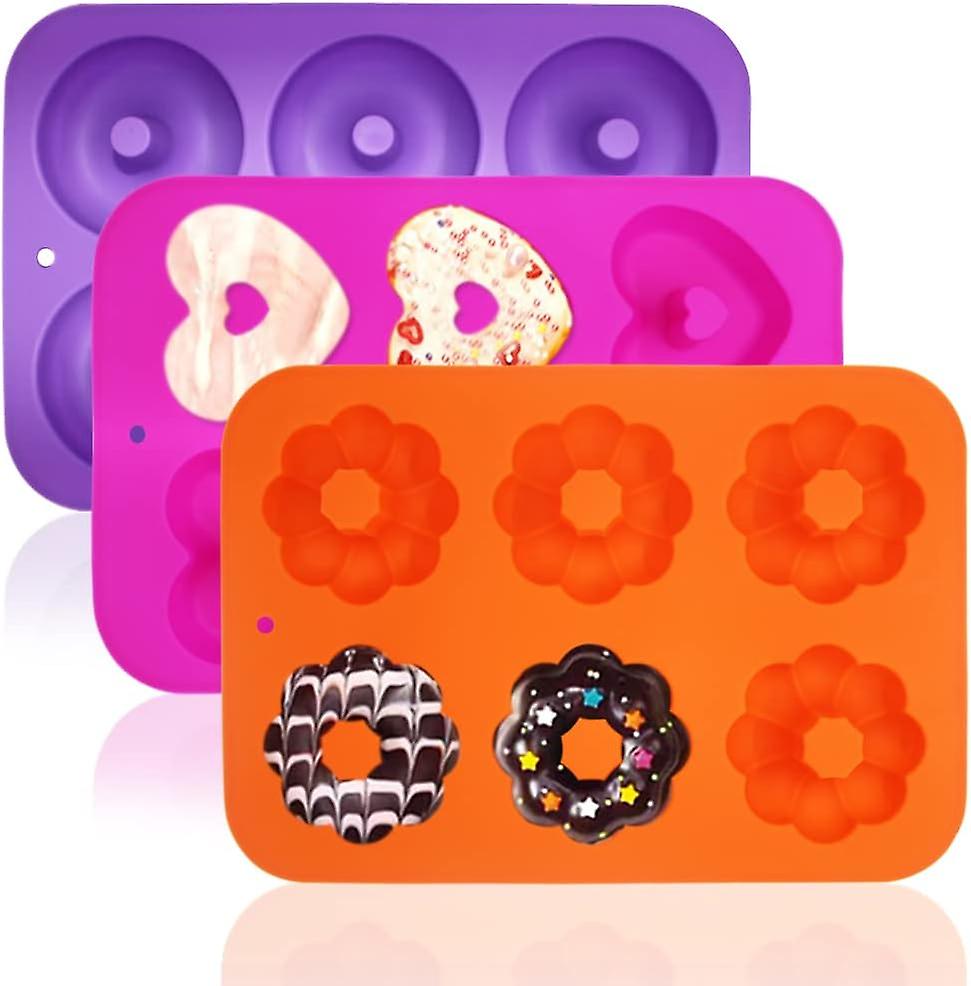 Set Aus Antihaftbeschichteten Silikon-donutformen Zur Herstellung Von Donuts, Muffins, Cupcakes Und Bagels