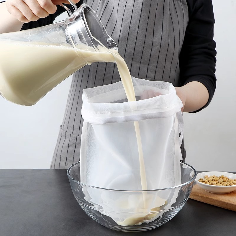 Set Aus 2 Wiederverwendbaren Nussmilchbeuteln, Lebensmittelsieb, Nussbeuteln Und Küchensieb. Kompatibel Mit Entsaftern.