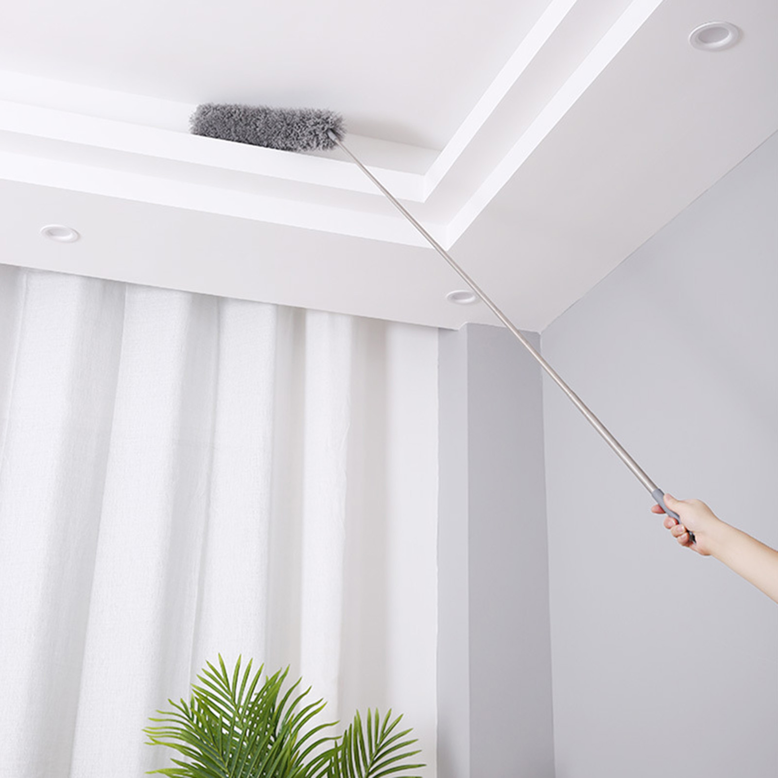 Mikrofaser-staubwedel Mit Langem Teleskopstiel Und Flexiblem Kopf Zum Entfernen Von Spinnweben Von Der Decke.