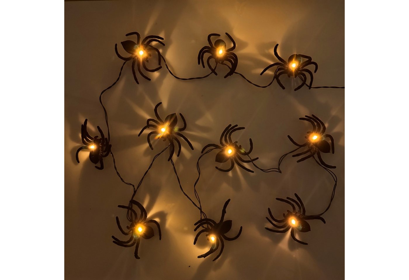 Online-Fuchs LED-Lichterkette mit 10 Spinnen und warmweißer LED-Beleuchtung - Halloween Deko, inklusive 6-Stunden Timerfunktion