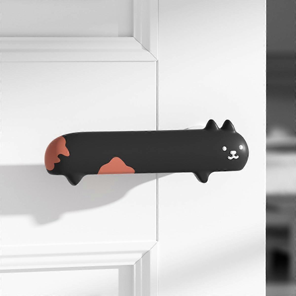 Set Mit 2 Türgriffschonern Aus Silikon In Katzenform, Rutschfest Und Hitzebeständig, Farbe Schwarz (links).