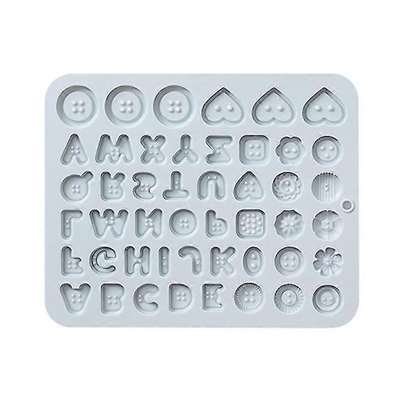 Schokoladenformen Aus Silikon In Form Von Buchstabenknöpfen. Ein Ideales Geschenk Für Kinder. Einfach Zu Verwendende Form.