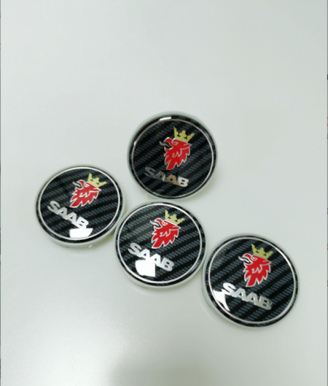 Saab Radkappen Silber Mit Schwarzem Schachbrettmuster, 63 Mm, 4er-set, Einheitsgröße [nx]